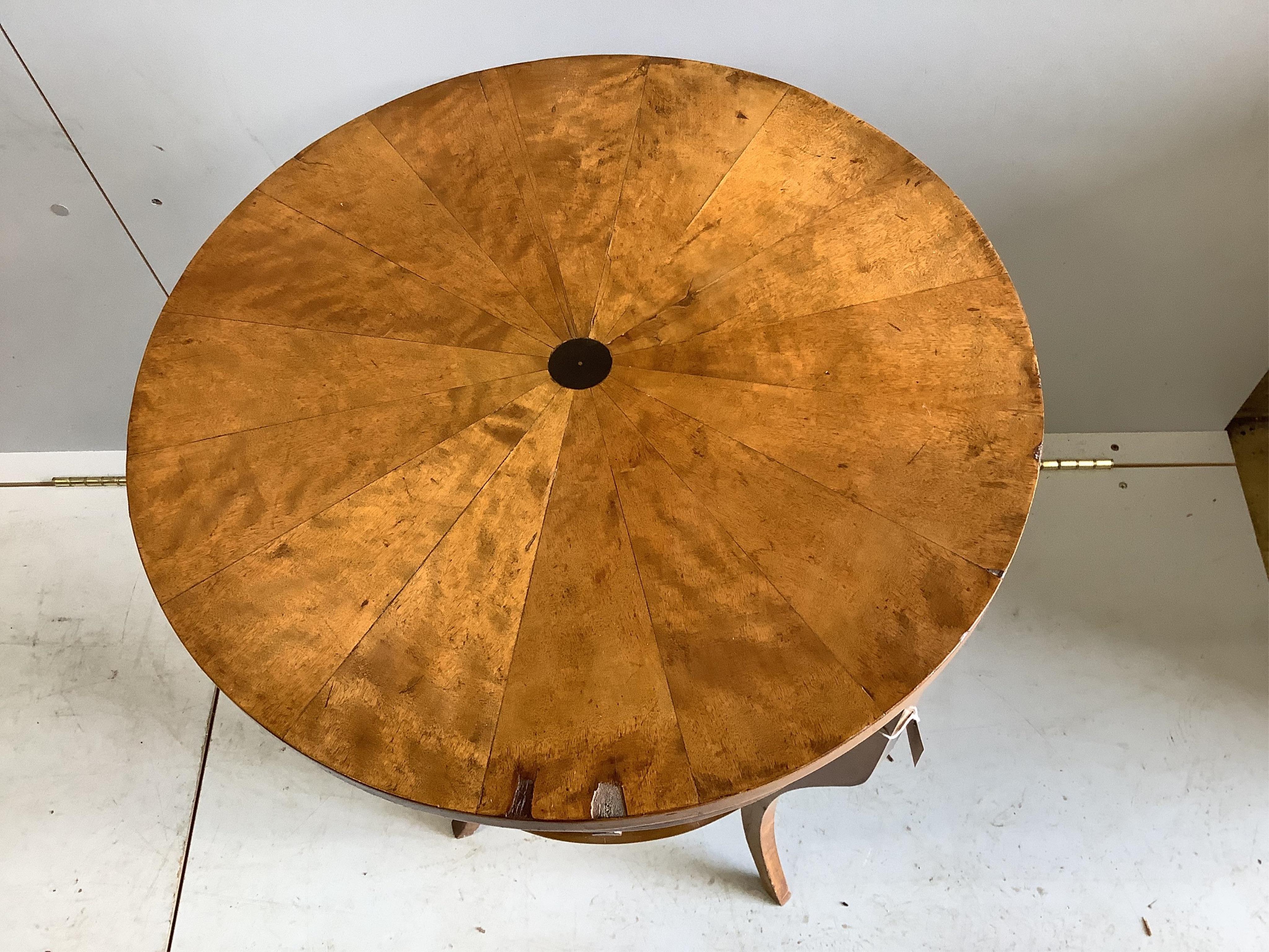 A 19th century Swedish Biedermeier circular birch work table, diameter 50cm, height 74cm. Condition - fair